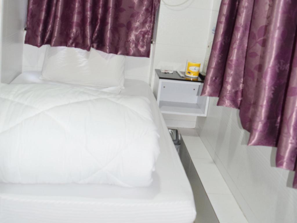 Om Guest House Hongkong Rom bilde