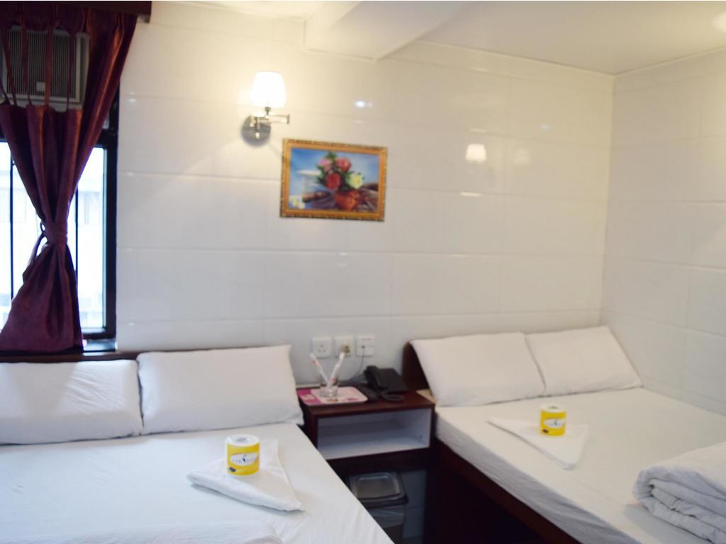 Om Guest House Hongkong Rom bilde